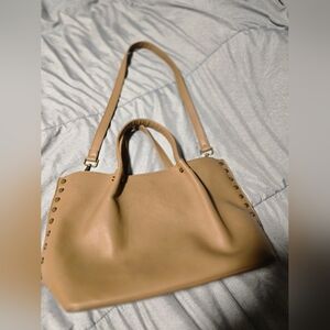 The drop studded Hillary tote bag.